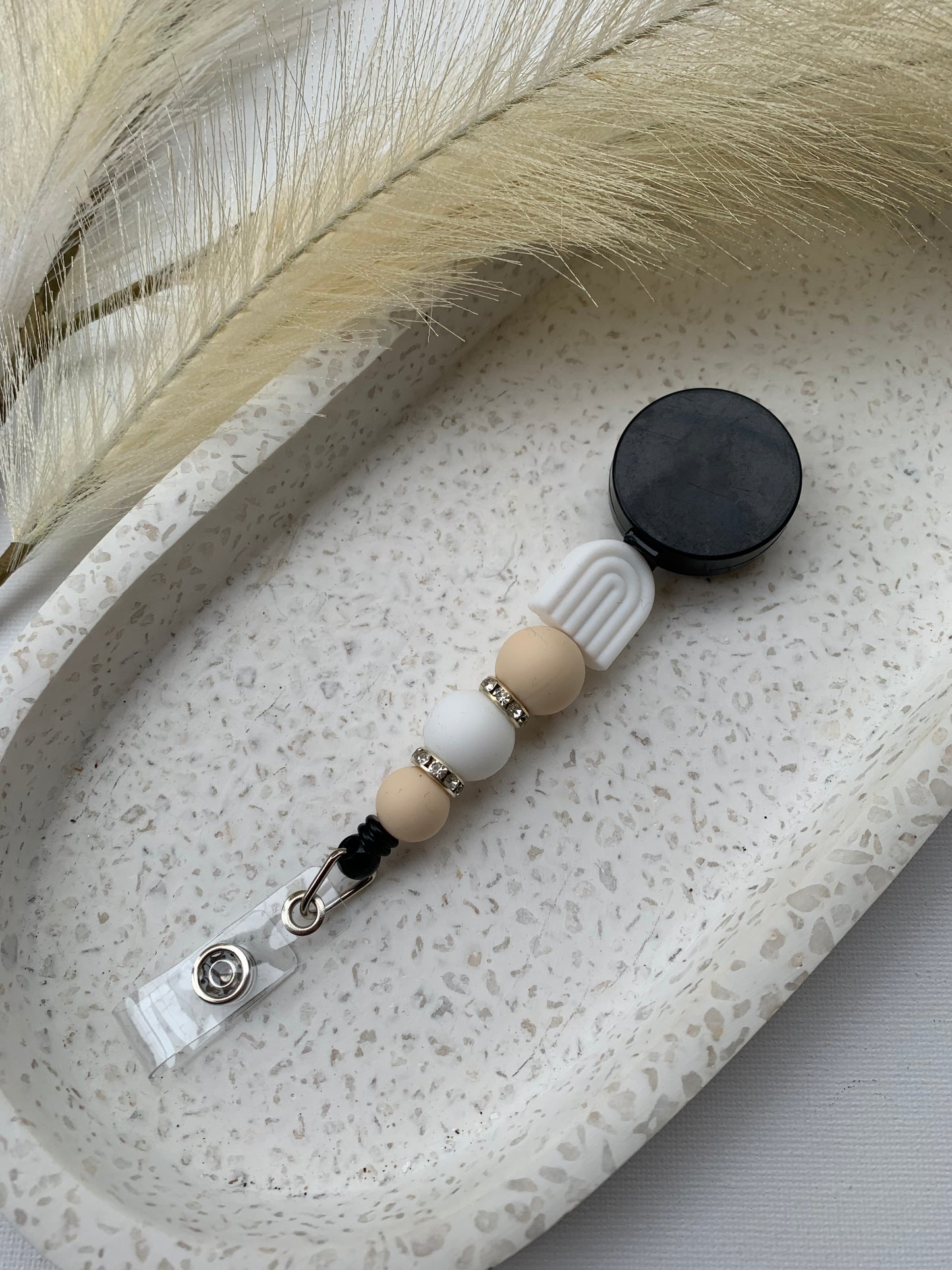 White Arch and Cream Badge Reel
