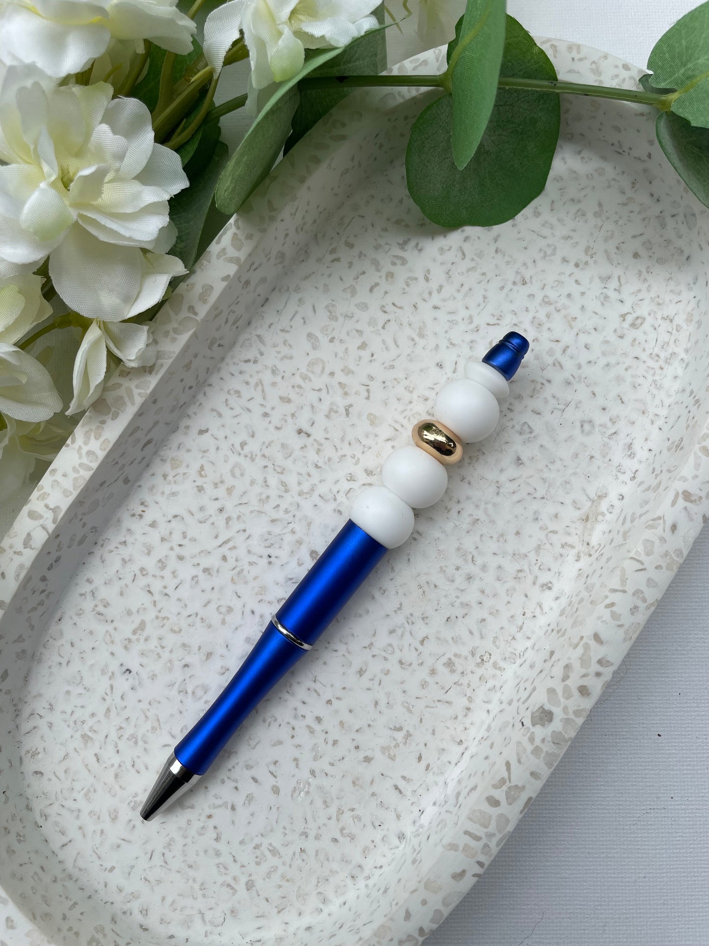 White Gold and Blue Pen